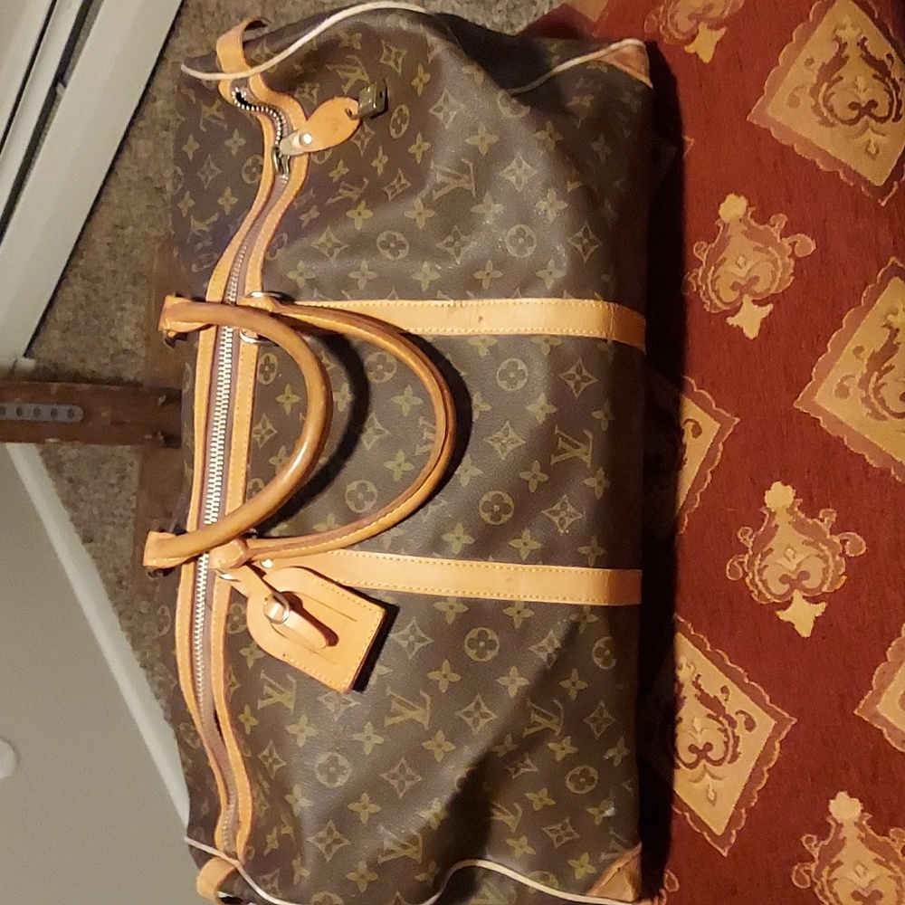 Vintage Louis Vuitton weekend duffle